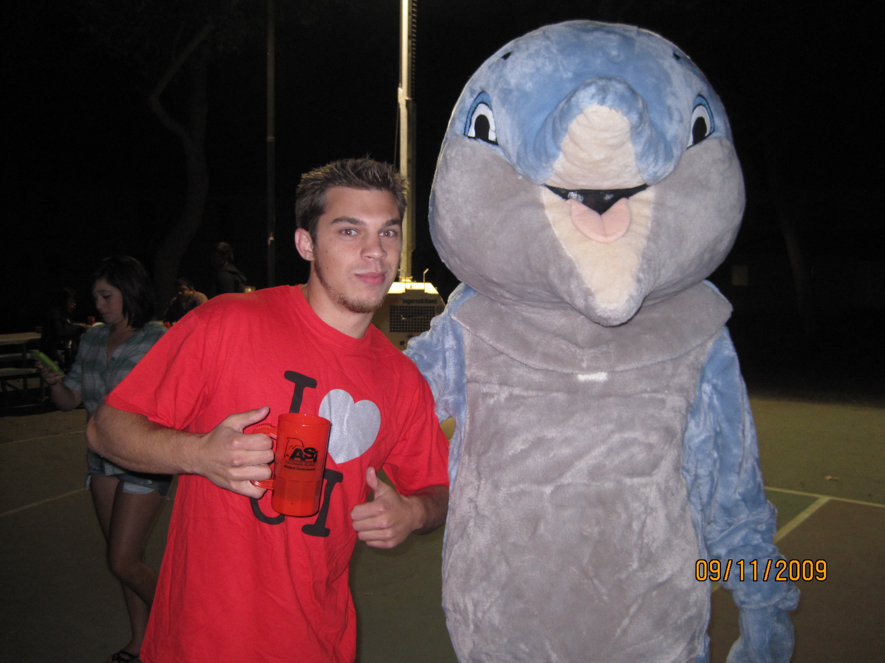 Paul Southerland with Dolphin Mascot